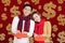 Asian young couple celebrating for chinese new year. chinese text happy new year 2020