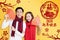 Asian young couple showing red envelopes for chinese new year.chinese text happy new year 2020