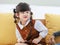 Asian young lonely little cute preschooler daughter girl playing doctor patient using stethoscope  on cozy sofa in living room at