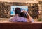 Asian young lovers watching television on sofa. Couples and Relax concept. Holiday and vacation concept. Night dating and