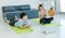 Asian young male female husband and wife in sportswear sport bra legging sneakers sitting, lay down smiling on yoga mat floor