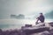 Asian young man enjoys a Papuma beach view