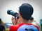 Asian young man watching plane show