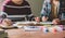 Asian young man and woman sitting pointing studying examining, Tutor books with friends Young students campus helps friend