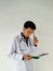Asian young medical doctor in the critical office in the hospital doing laboratory test