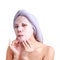 Asian young woman face, girl applying facial peel off mask