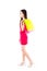 Asian young woman walking full length of with shopping bag isolated.