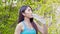 Asian young woman wearing sportswear drinking fresh water after workout exercise and jogging run to refreshing. Healthy woman