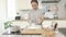 Asian young women Sift the flour to make cakes, slow motion.