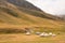 Asian yurts of the nomads on the beautiful mountain meadow in Kyrgyzstan