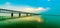 Asiaâ€™s third largest road cum railway bridge crossing over the beautiful river Godavari at sunset.