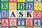 Ask a question to find answers with wooden cubes
