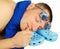 Asleep man, plimsolls, towel and antisun glasses