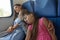 Asleep mom and daughters fell asleep in an electric train car