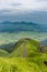 Aso volcano mountain and farmer village from hill top in Kumamoto, Japan