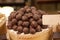 Asorted chocolate truffles and pralines. Chocolate and coconut candies on the counter in the confectionery store
