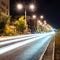 Aspalt road with illuminations in the city