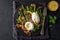 Asparagus, avocado, poached egg and fried bacon  salad