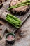 Asparagus. bunch of fresh asparagus. banches of fresh green asparagus on dark background, Pickled Green Asparagus. Close up.