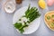 Asparagus cooked on a plate topped with parmesan