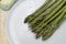 Asparagus in a Plate with Water Droplets