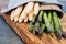 Asparagus tied on a wooden board