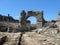 Aspendos, view of arched gate and ancient pathway led to Agora