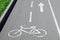 Asphalt bicycle path with the image of a bicycle