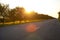 Asphalt of country road in backlit