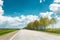 Asphalt Freeway, Motorway, Highway Against Background Of Eastern European Landscape.