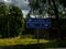 Asphalt highways road surrounded by forest, road sign, land transport and traveling background, backdrop