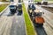 Asphalt laying equipment. Asphalt paver machine on the road repair site. Road renewal process, construction work. View from above