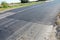 Asphalt pavement. Road Pavers, New Asphalt Laid Down. Asphalt paving - New road construction