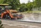 Asphalt paver machine makes a new road