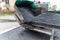 Asphalt paver in road construction - close-up