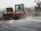 Asphalt paving equipment - road roller truck asphalt laying machine during roadworks
