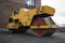 Asphalt paving machine . Asphalt road roller with heavy vibration roller compactor