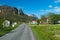 Asphalt road across norwegian village