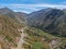 Asphalt road bends through Angeles National forests mountain, California, USA.