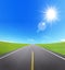 Asphalt road with cloudy sky and sunlight