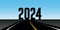 asphalt road direction 2024 blue sky background