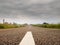 Asphalt road, low angle, Cloudy sky, Concept driving, way to your destination