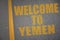 Asphalt road with text welcome to yemen near yellow line. concept