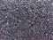 Asphalt road texture. Black asphalt texture background. Surface grunge rough of asphalt. A smooth dark grey asphalt pavement.