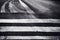 Asphalt road texture with lines grunge abstract background seamless pattern. Rough artistic striped urban highway or