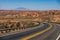 Asphalt road in USA. Barren scenery. Desert highway of the American southwest. Endless straight. Route 66, Arizona