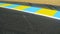 Asphalt Road With White and Colorful Stripes