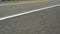 Asphalt Road With White and Colorful Stripes