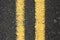 Asphalt road with yellow double dividing line