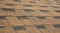 Asphalt Shingles Soft Focus Photo. Close up view on Asphalt Roofing Shingles Background. Roof Shingles - Roofing Construction